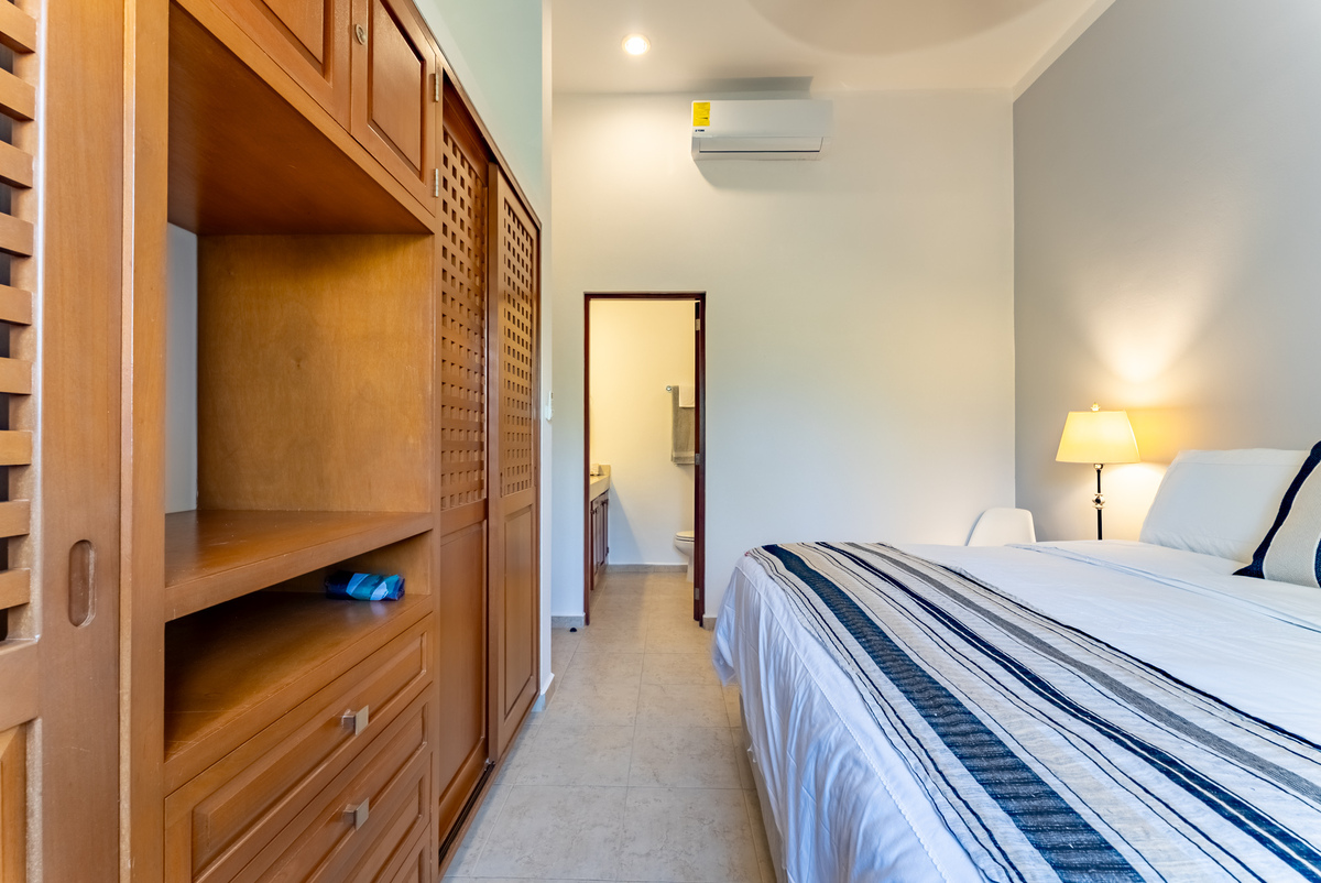 12 of 21: Master Bdrm with king bed