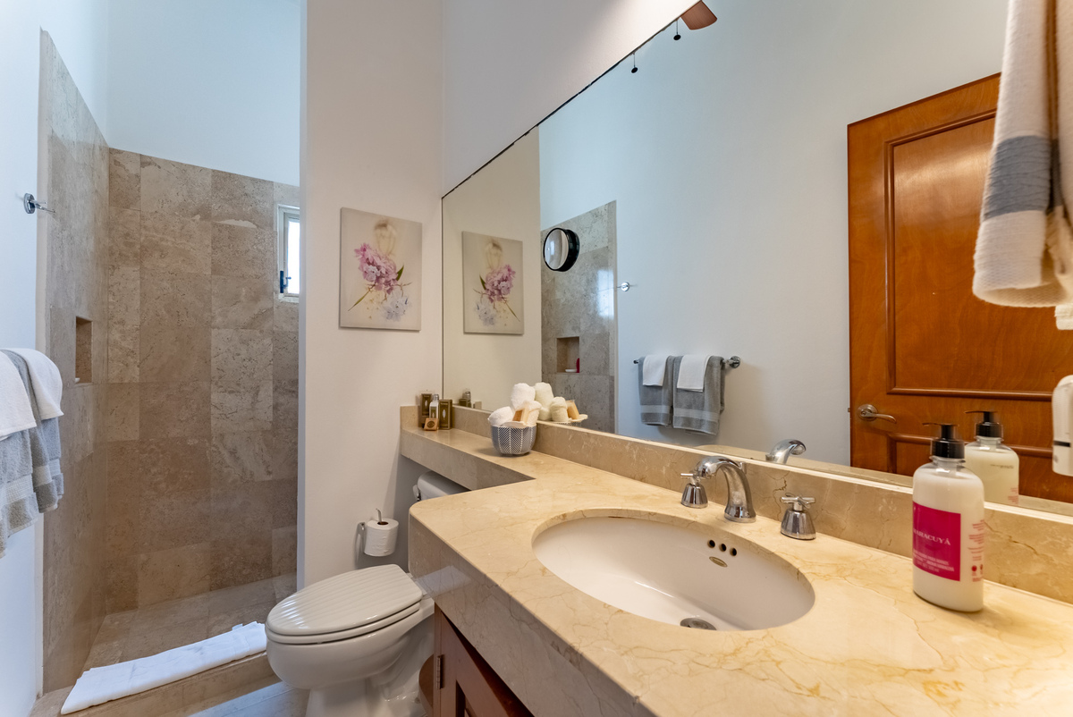 14 of 21: Hall Guest full bath