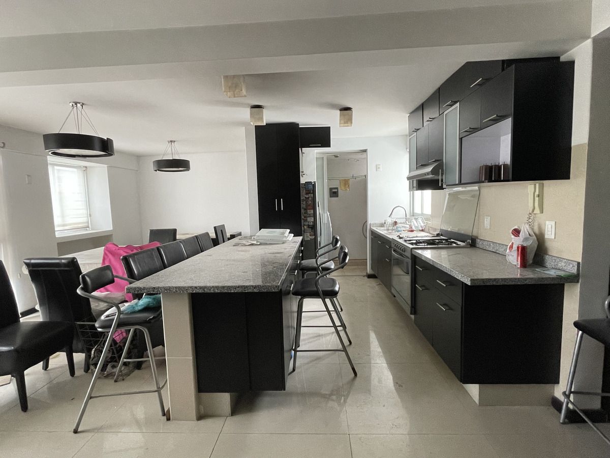 6 de 18: Cocina y Área de lavado