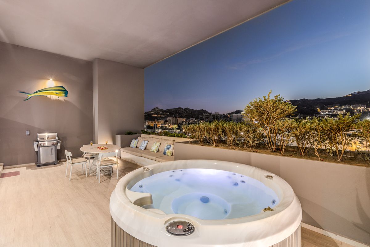 4 of 7: Private Terrace with Jacuzzi
