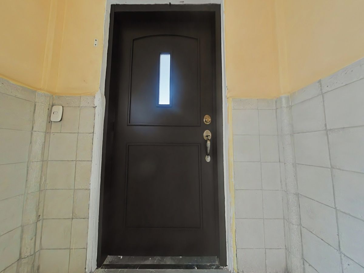 2 de 13: Entrada al departamento