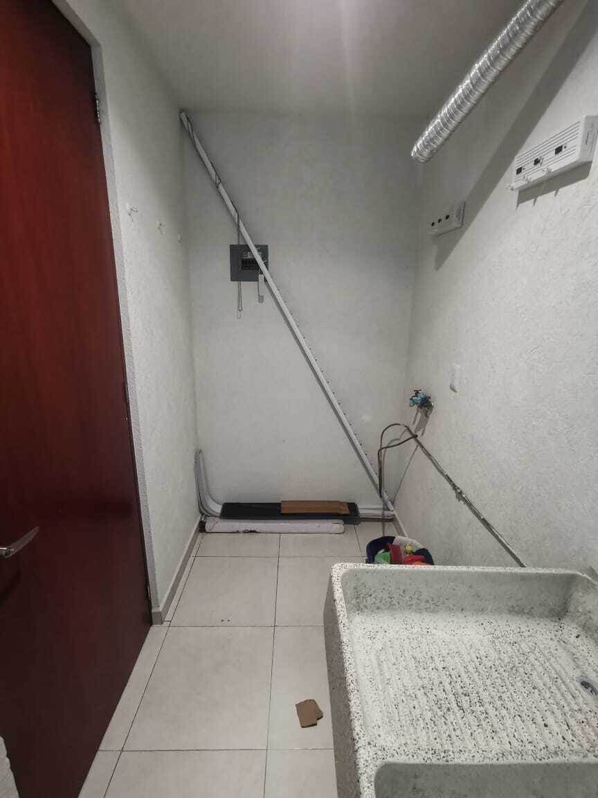 16 of 17: Área de Lavado y Tendido