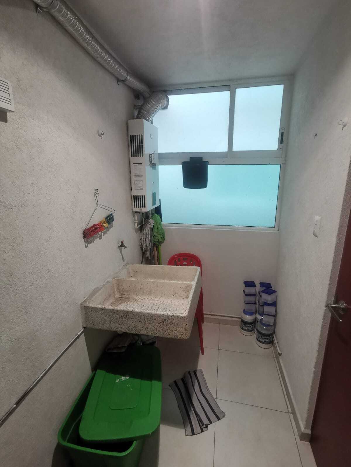 15 of 17: Área de Lavado y Tendido