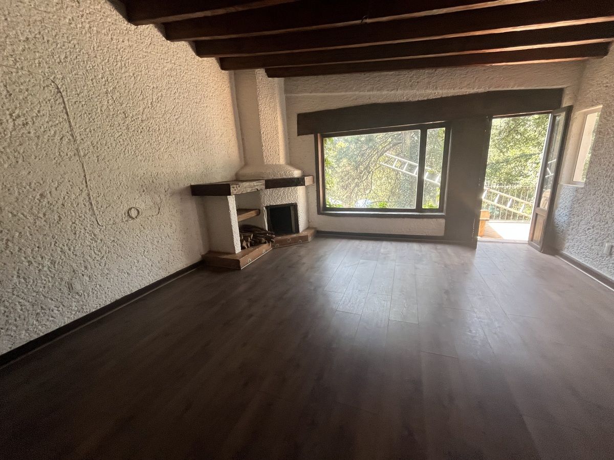 2 de 18: Recámara principal con chimenea