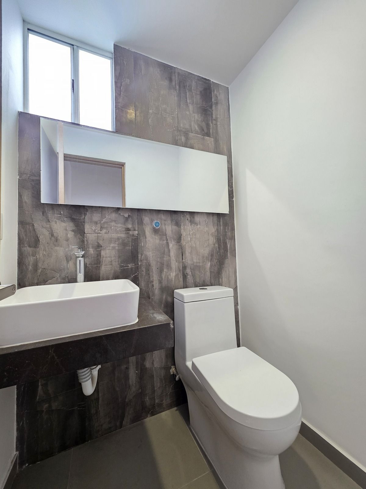 8 de 19: Medio baño