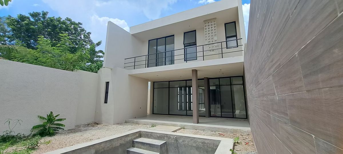 1 de 9: Fachada Posterior