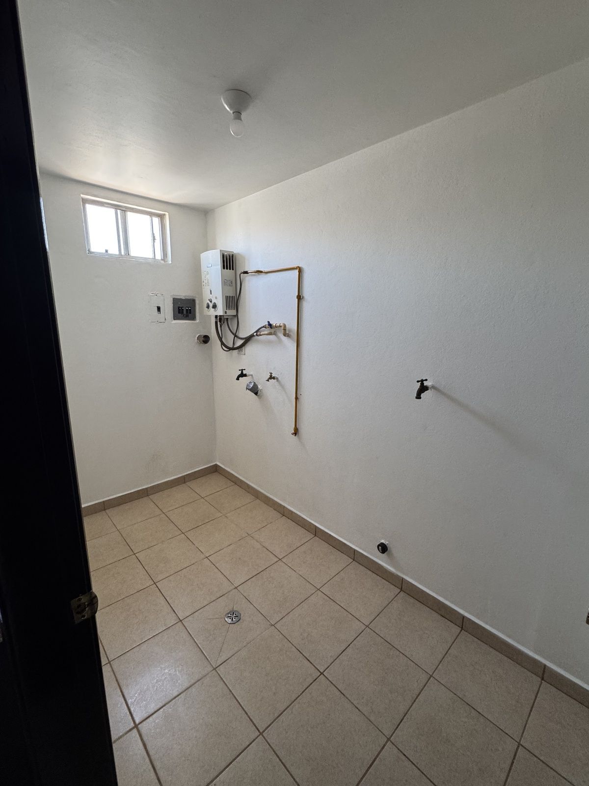 4 de 11: Cuarto de lavar