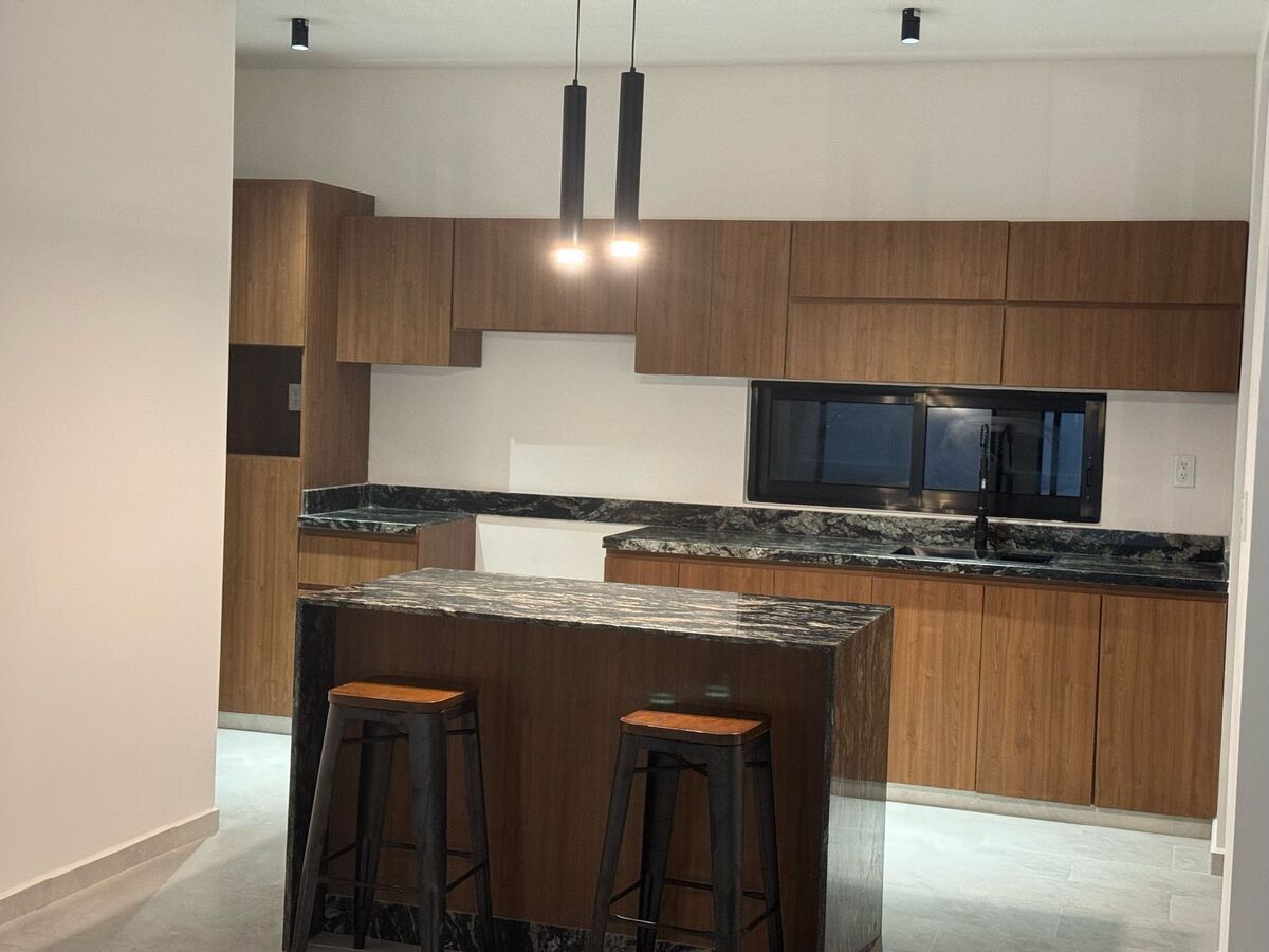 6 of 12: Casa muestra