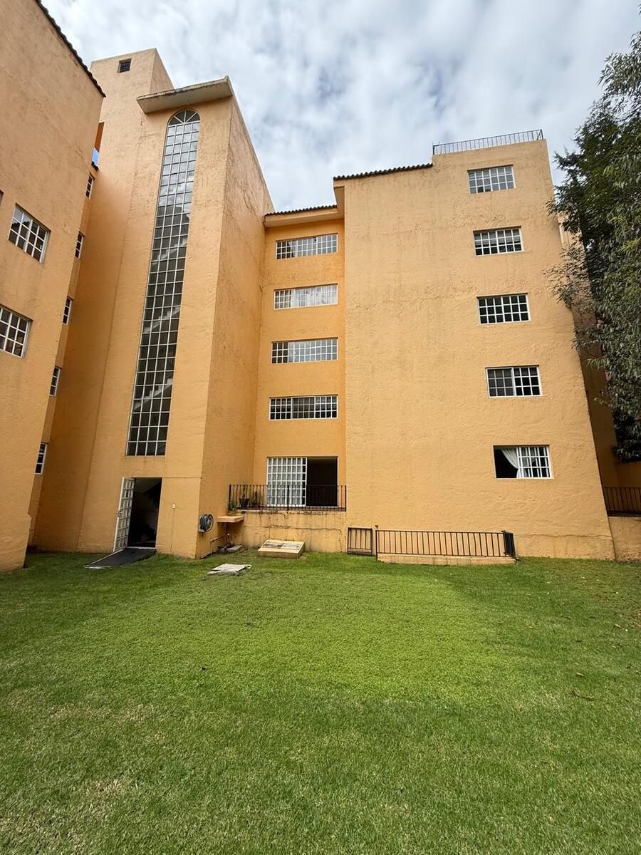 32 de 34: FACHADA POSTERIOR