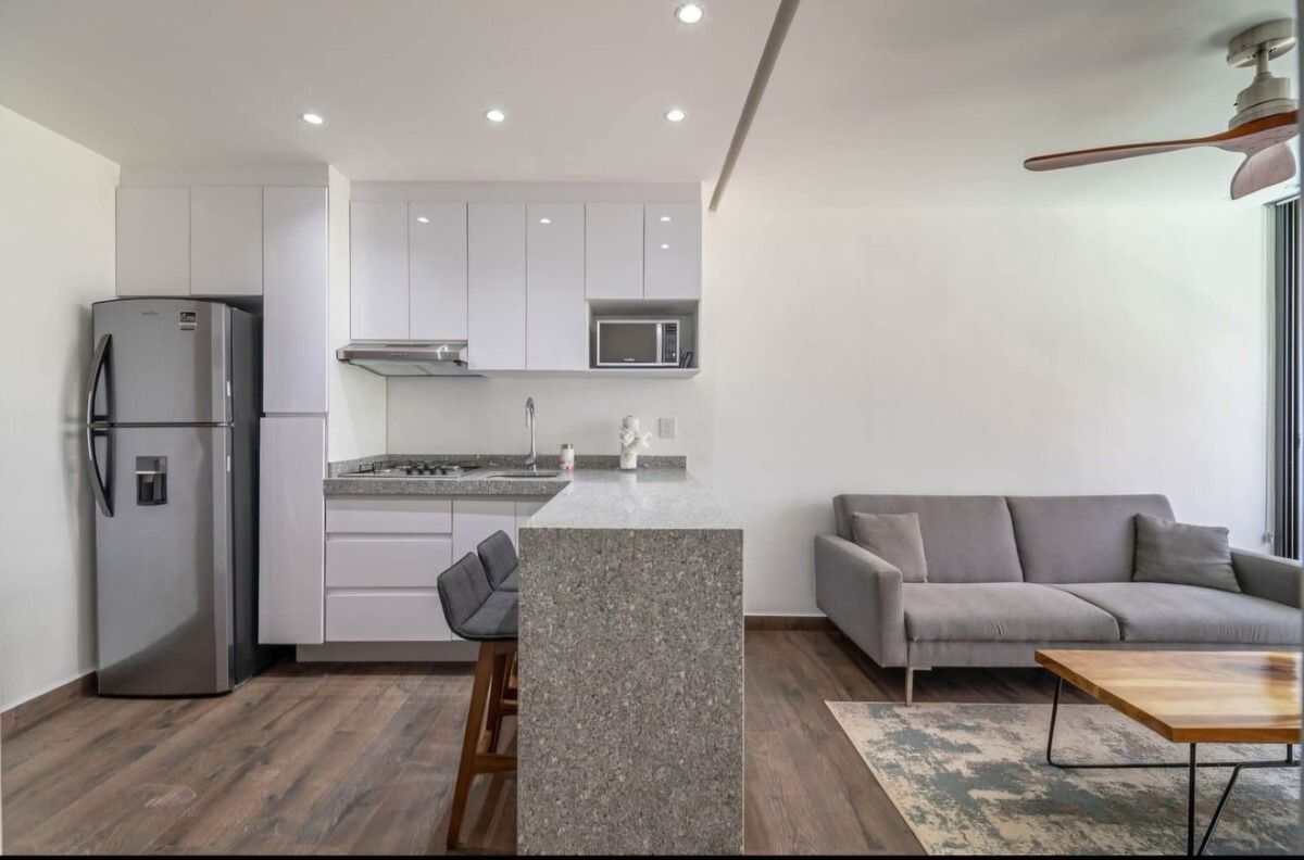 3 de 21: Open-plan living: kitchen, living room, modern design.