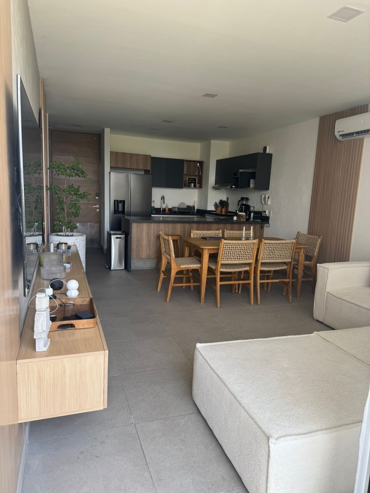 2 of 12: Sala-comedor , cocina y entrada al fondo