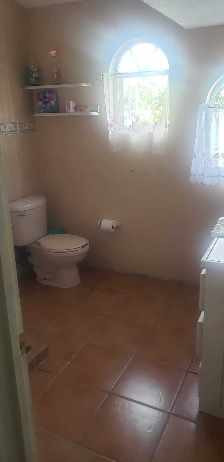 16 de 28: Baño compartido