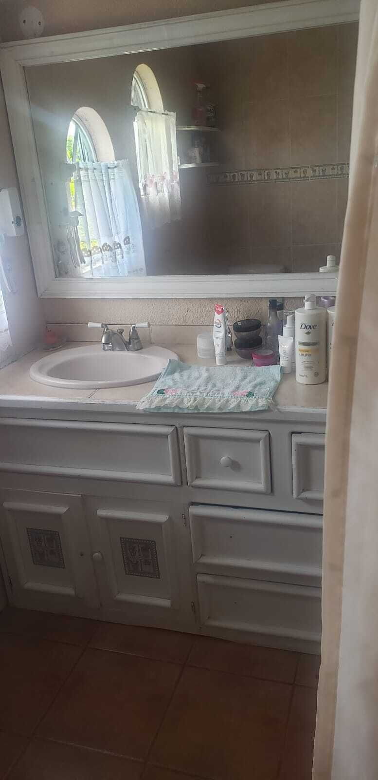15 de 28: Baño compartido
