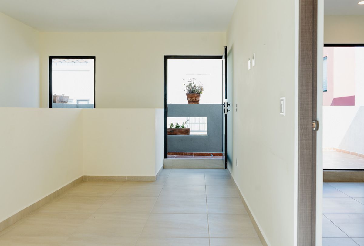 17 of 23: Family Room con salida a terraza