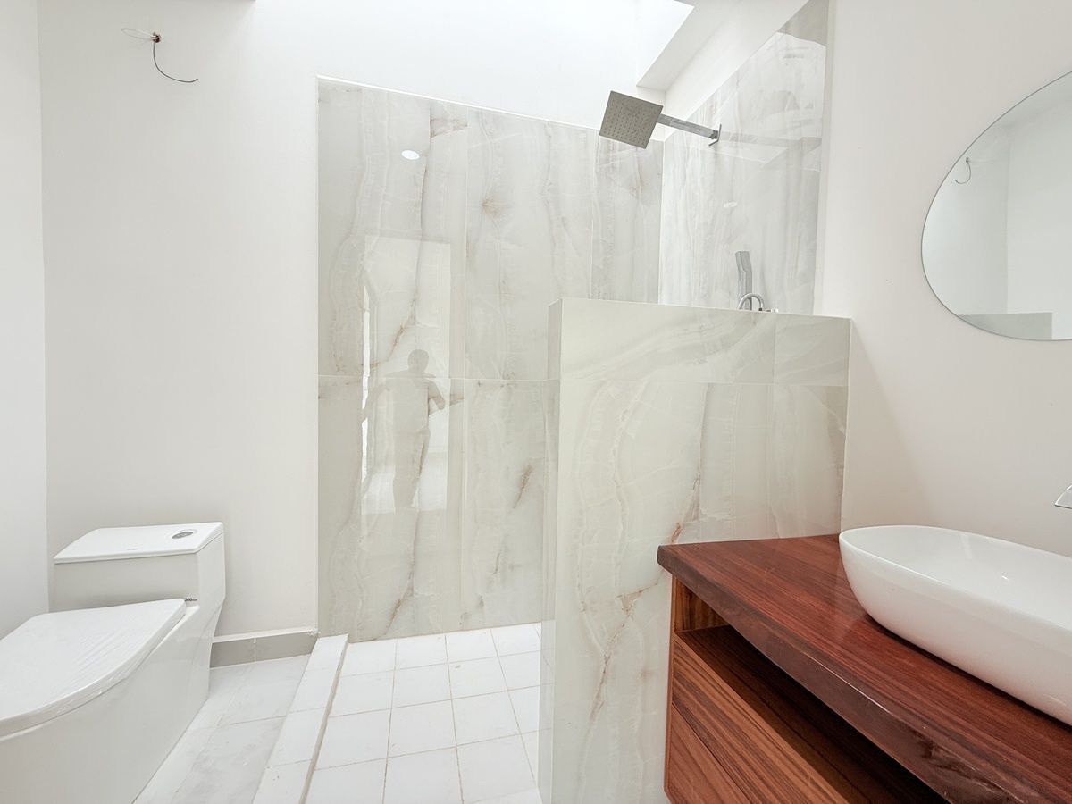 3 de 11: Baño, Habitación Planta Baja