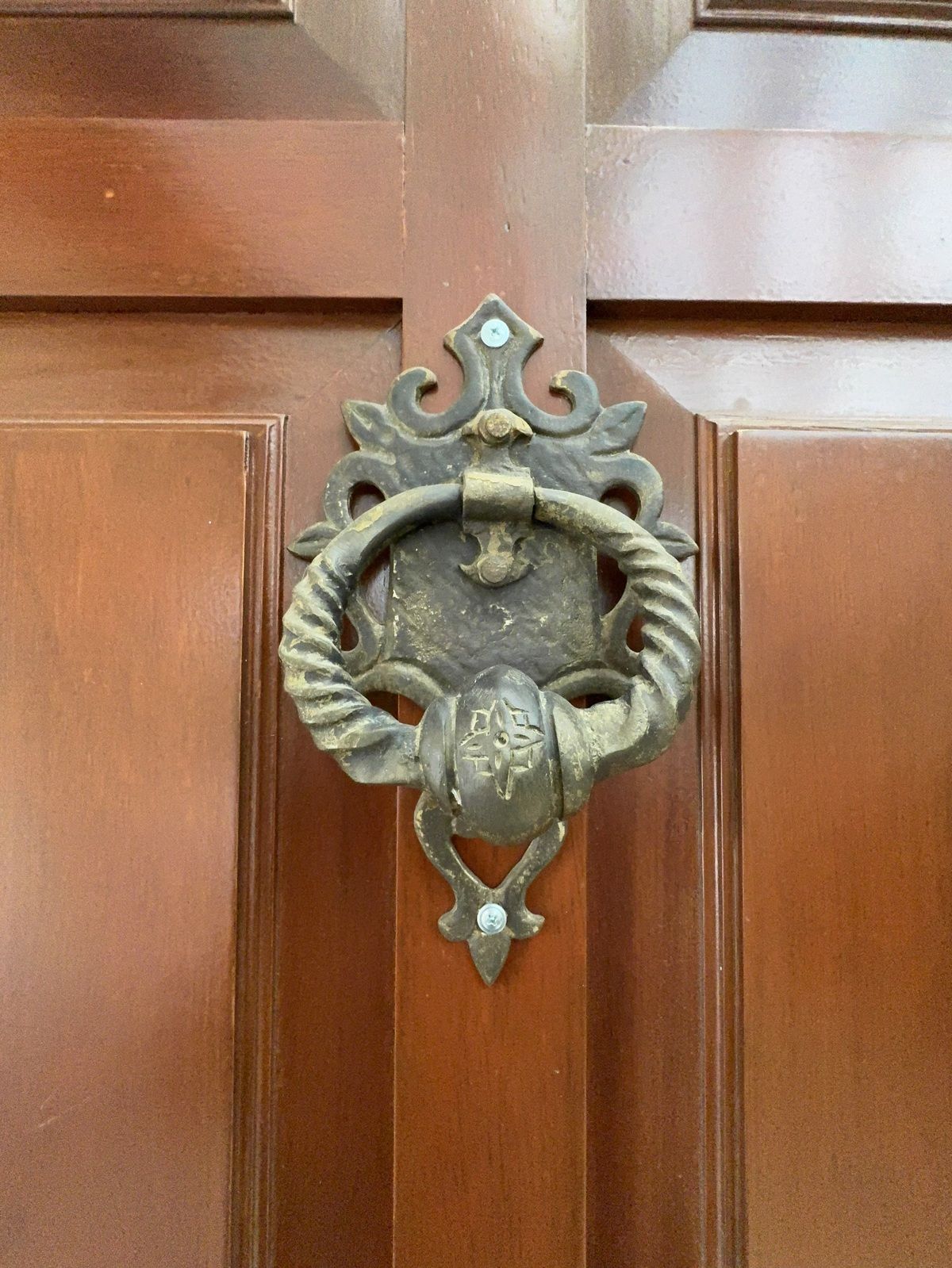 3 of 50: Puerta Principal entablerada con picaporte antiguo