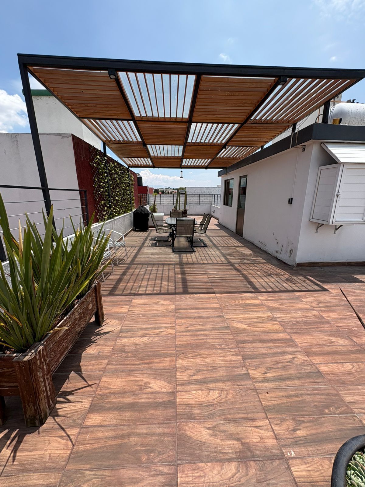 21 de 21: Roof garden con pérgola