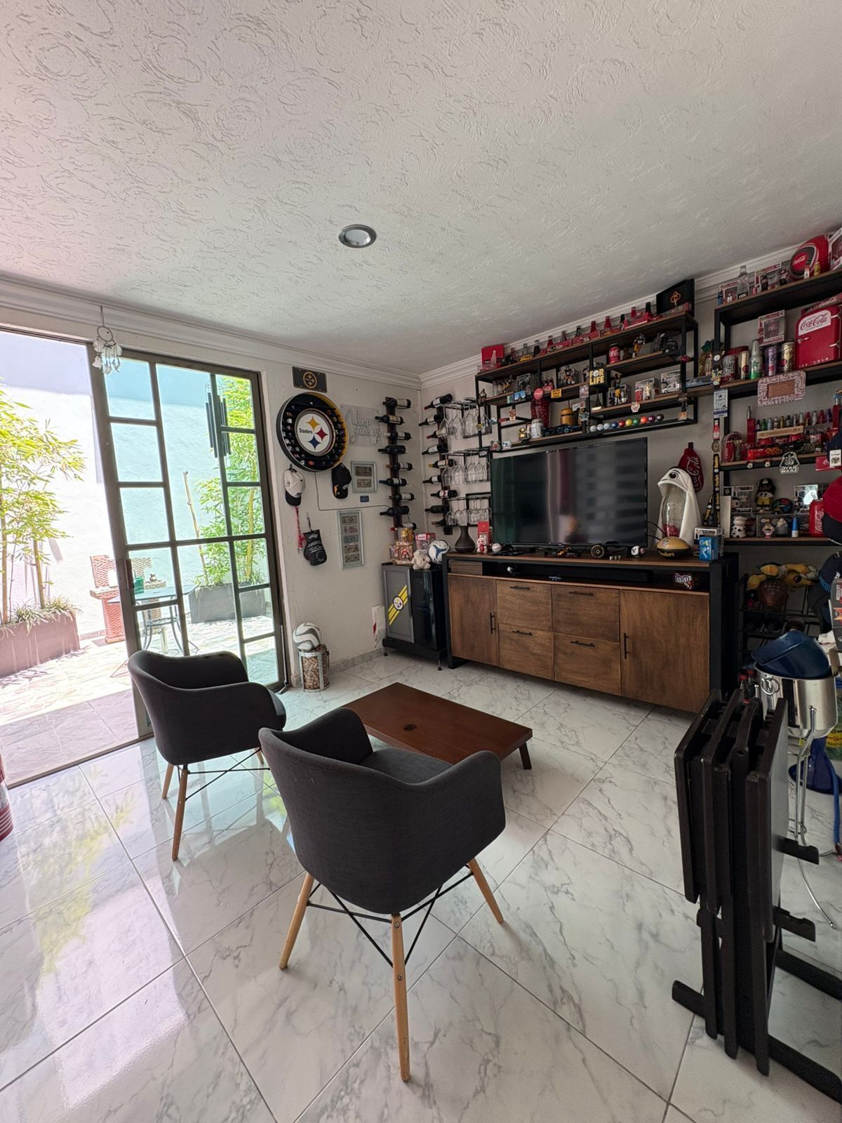 10 de 21: Versátil espacio para estudio o sala de tv