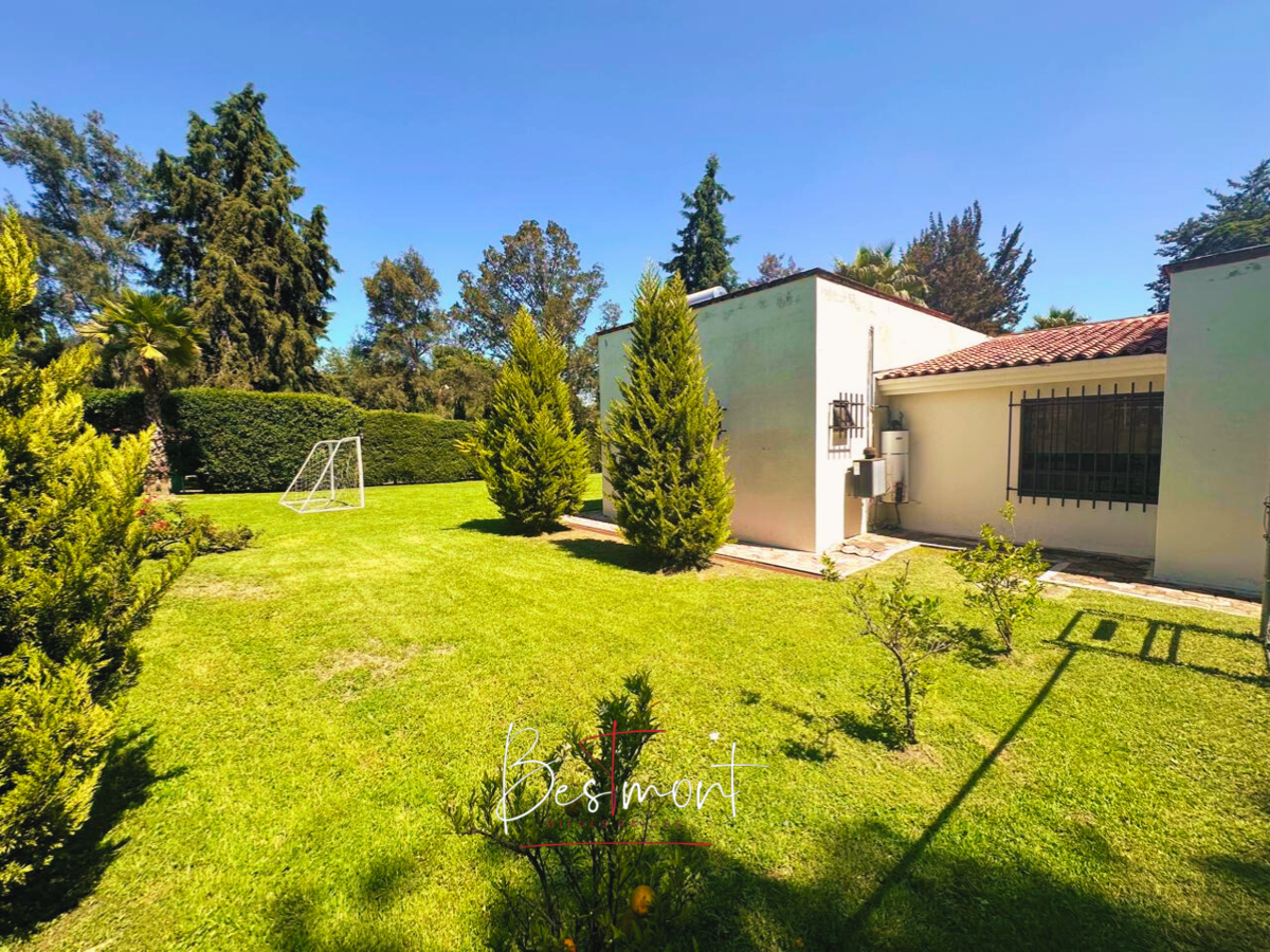 36 de 45: Jardín Frontal