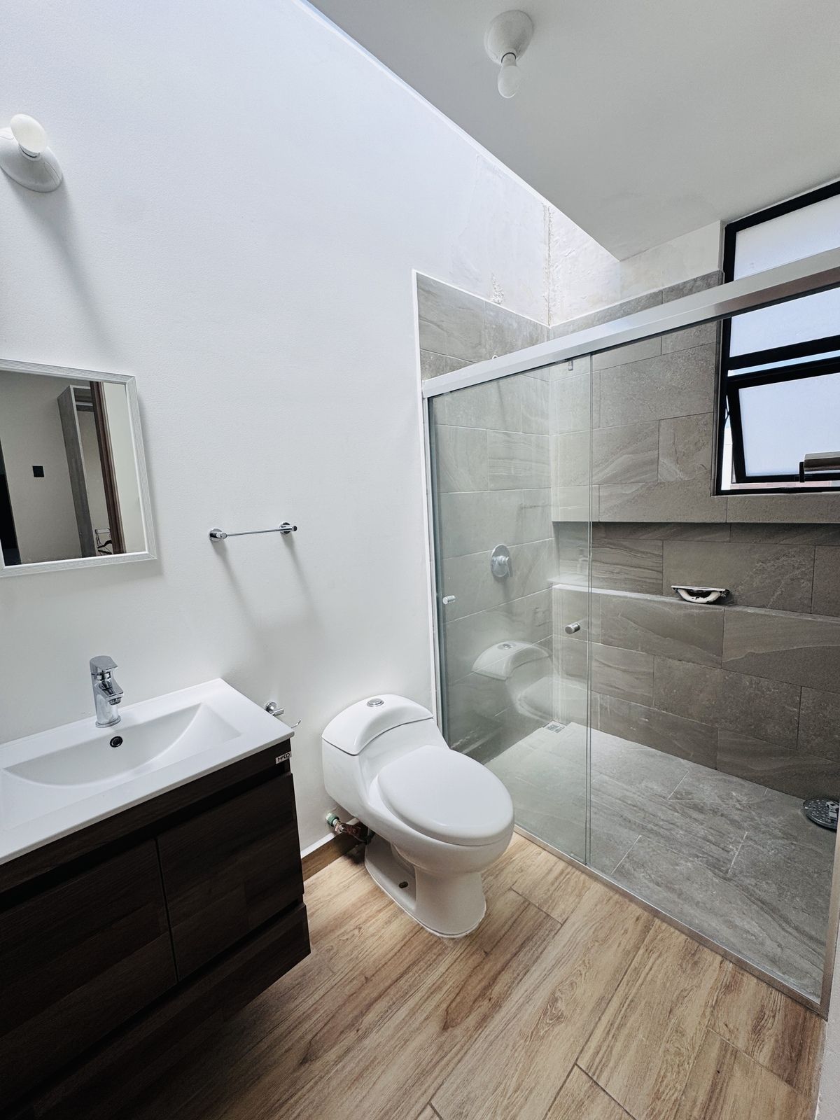 18 de 22: baño compartido