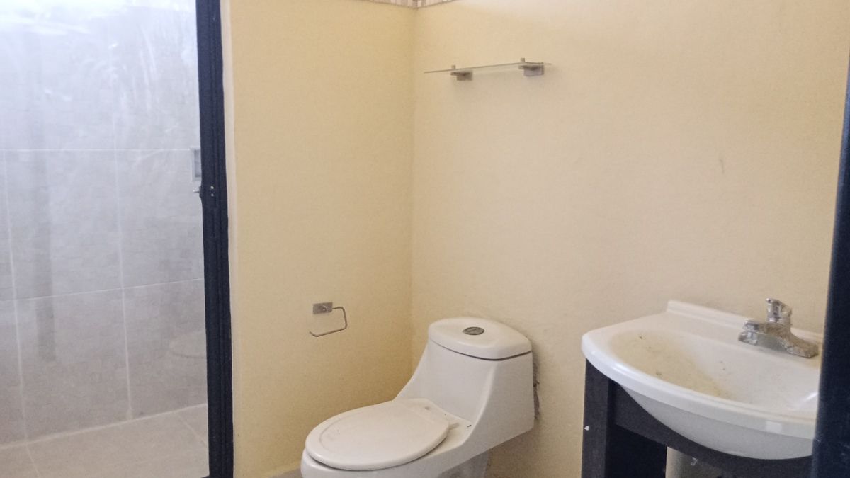 25 de 36: Baño compartido