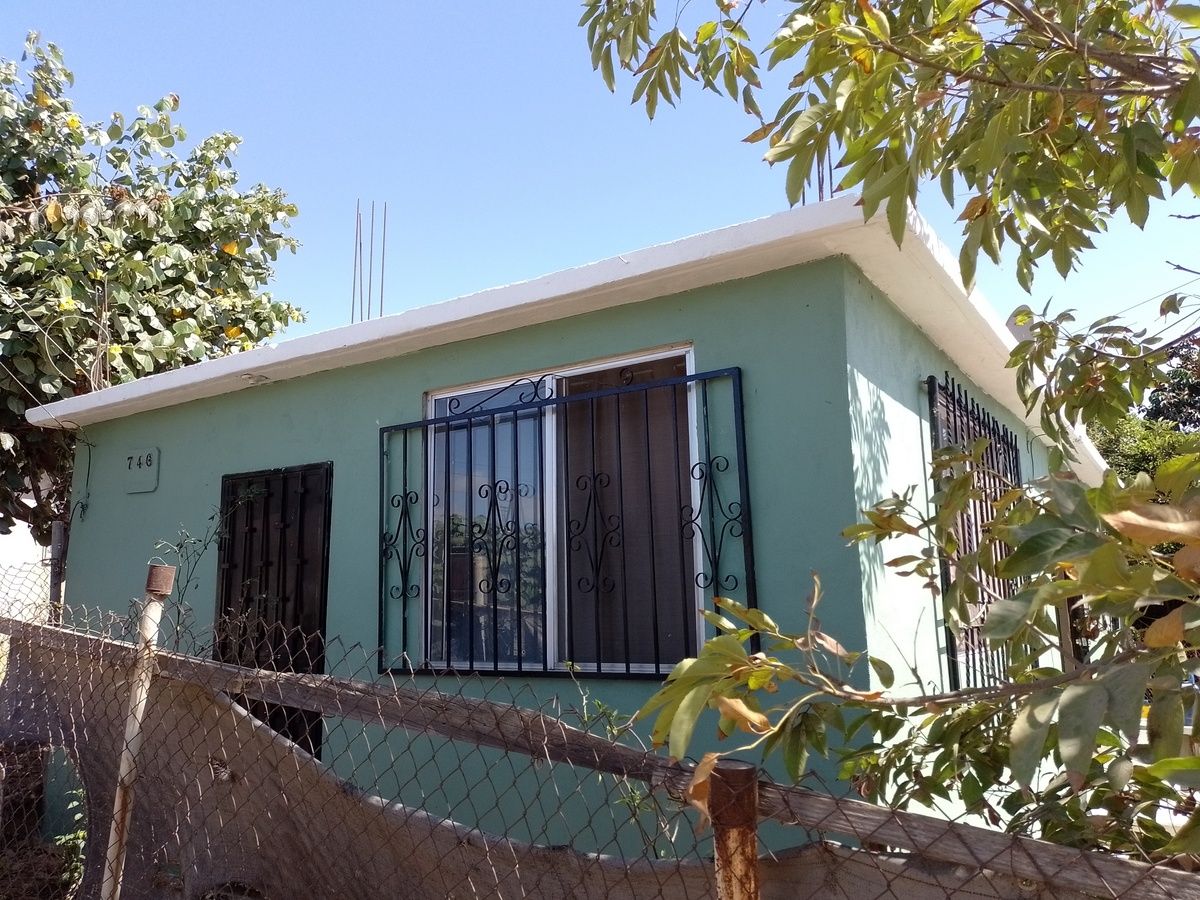 3 of 11: Fachada de casa