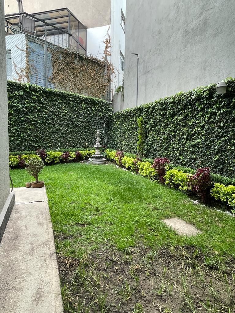 28 de 29: jardín común