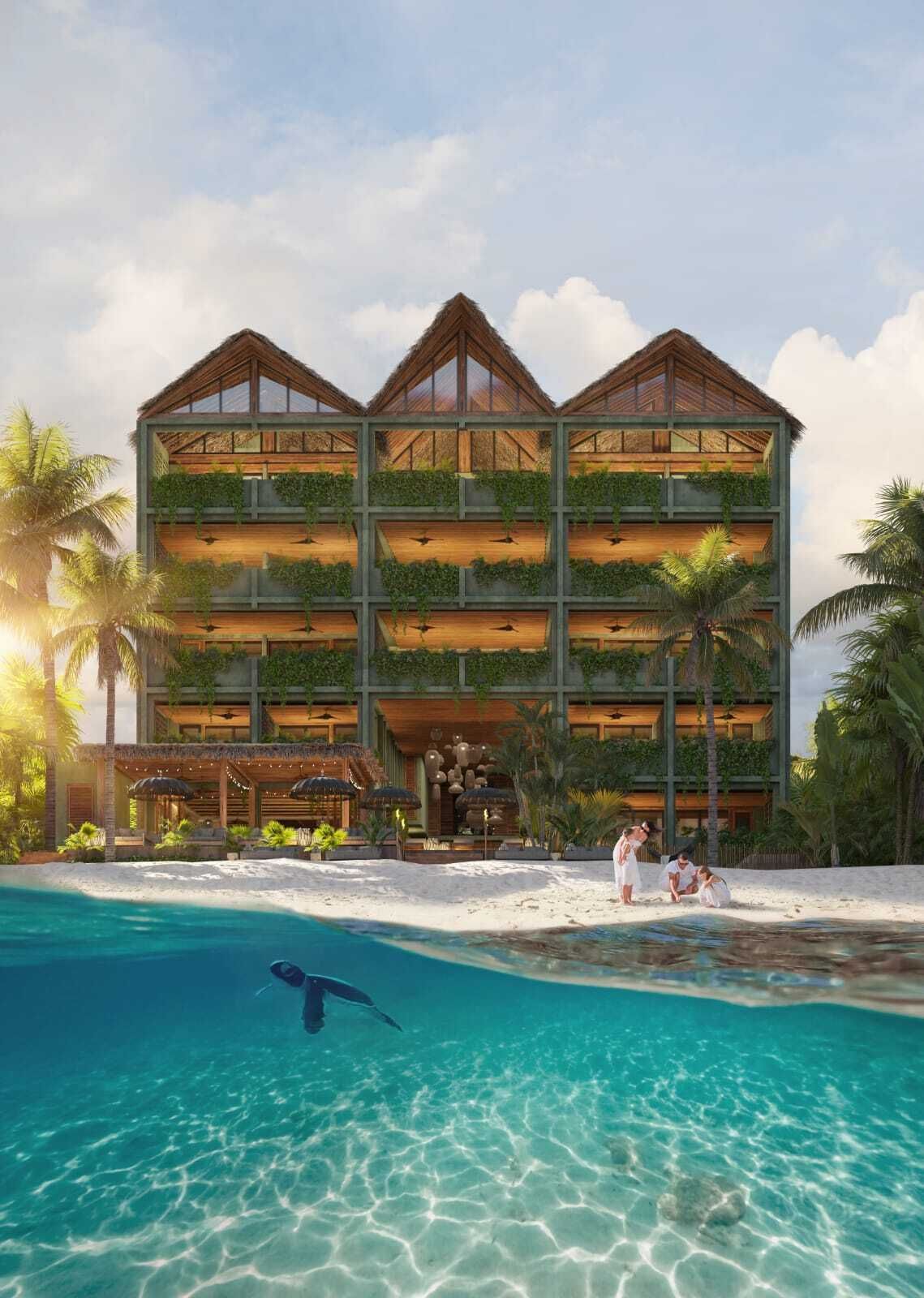 2 de 39: Tropical beach resort with ocean and palm trees.