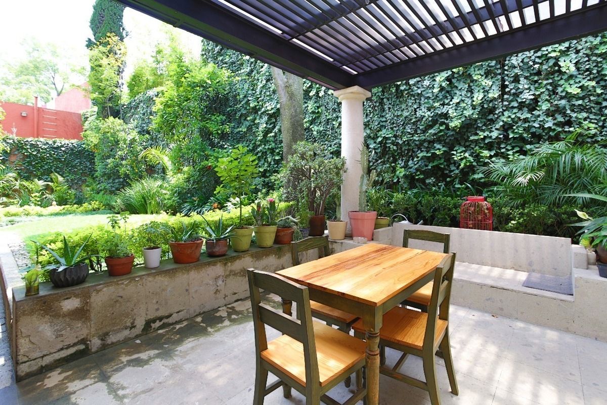 3 de 17: Terraza Cubierta en Jardín