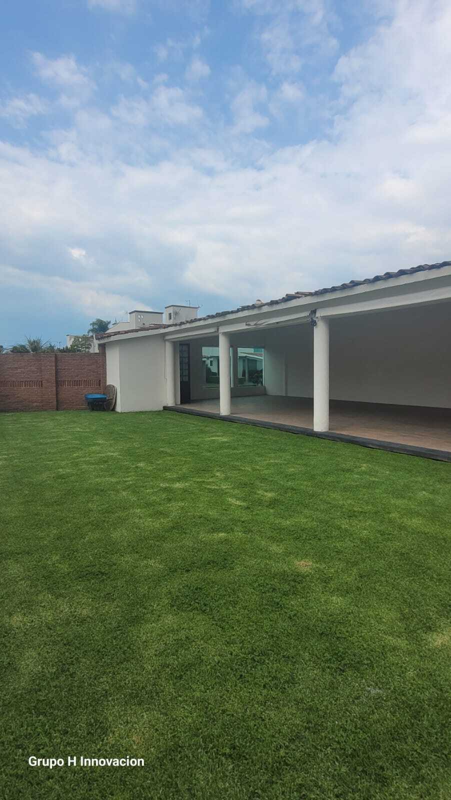 20 de 21: Salón de usos múltiples con jardín
