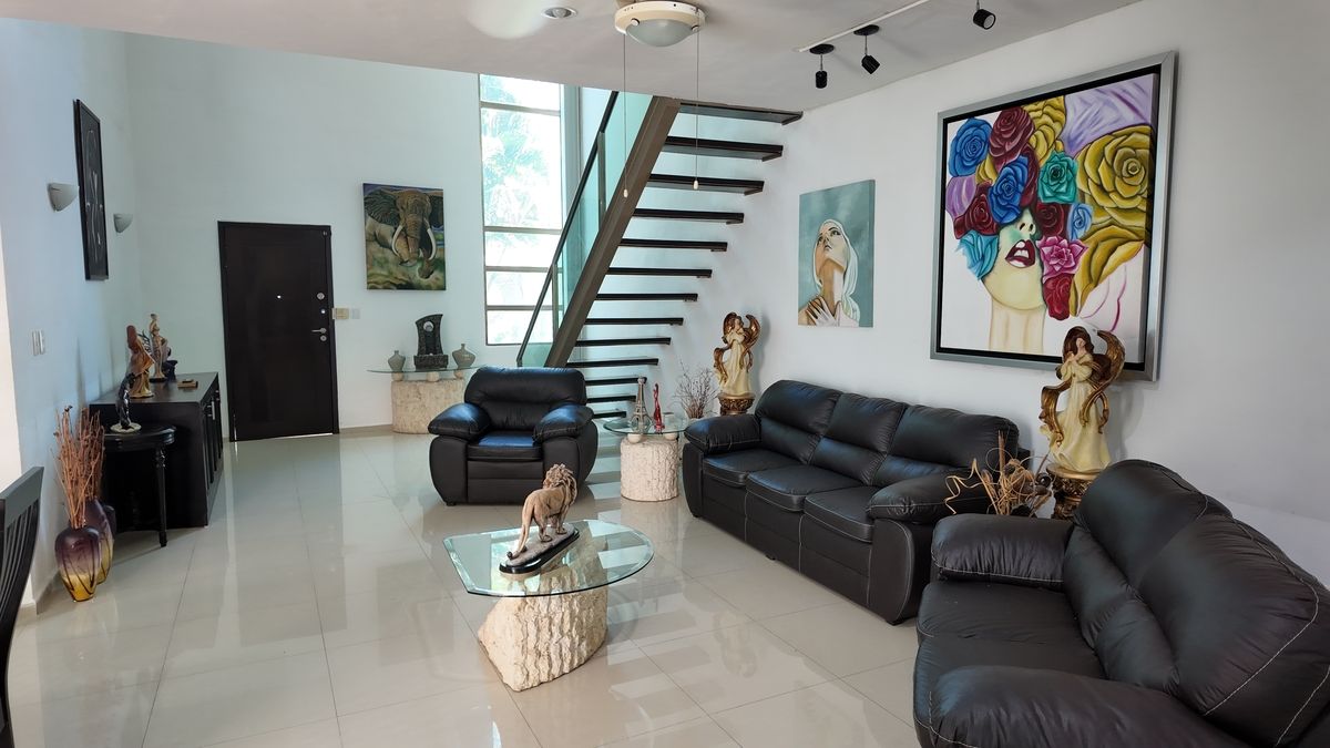 5 de 21: Sala y recibidor a dobla altura