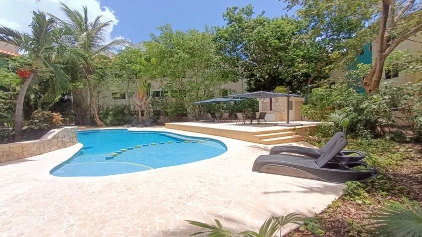 3 de 12: una alberca comun en bugambilias playacar