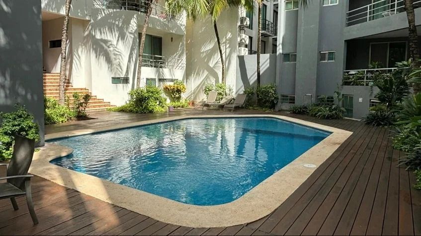 3 de 12: una alberca comun en condo capri playa del carmen