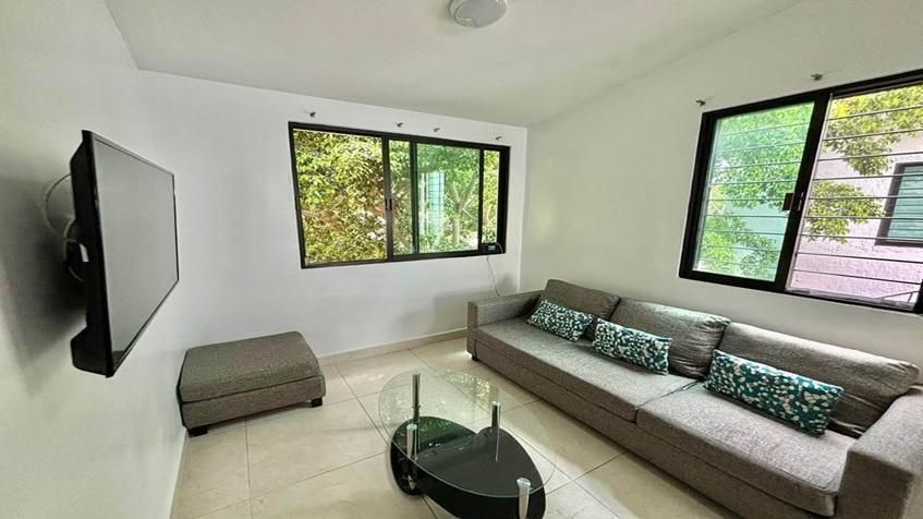 1 of 8: una sala y una tv en anemonas playacar
