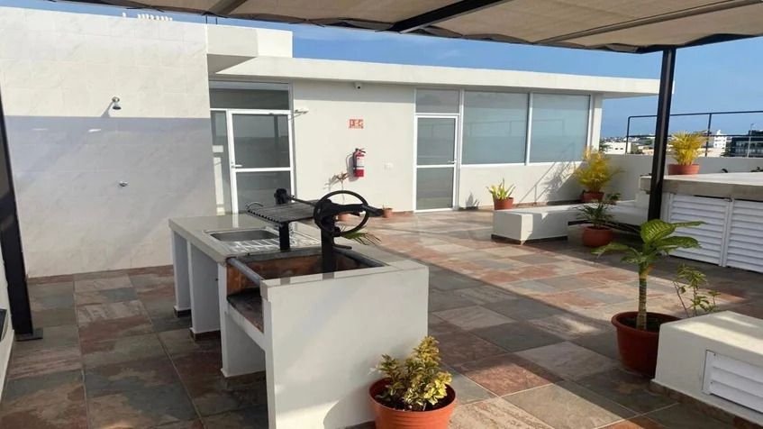 3 of 11: un area de asadores en yaakun condos playa del carmen