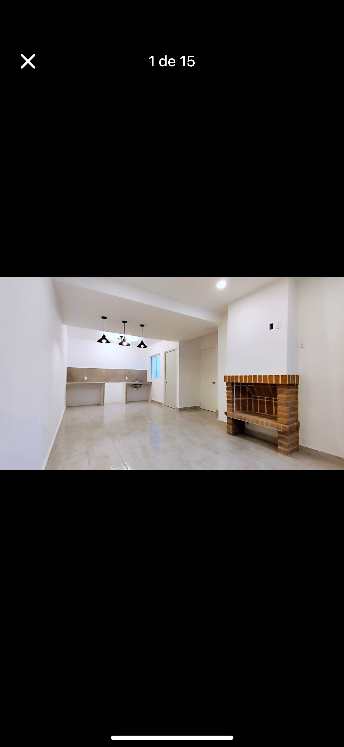 2 of 14: Sala cocina comedor y chimenea