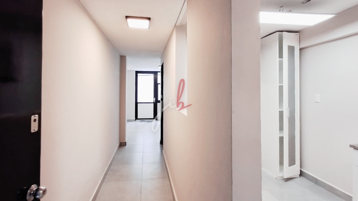 pasillo de acceso al departamento