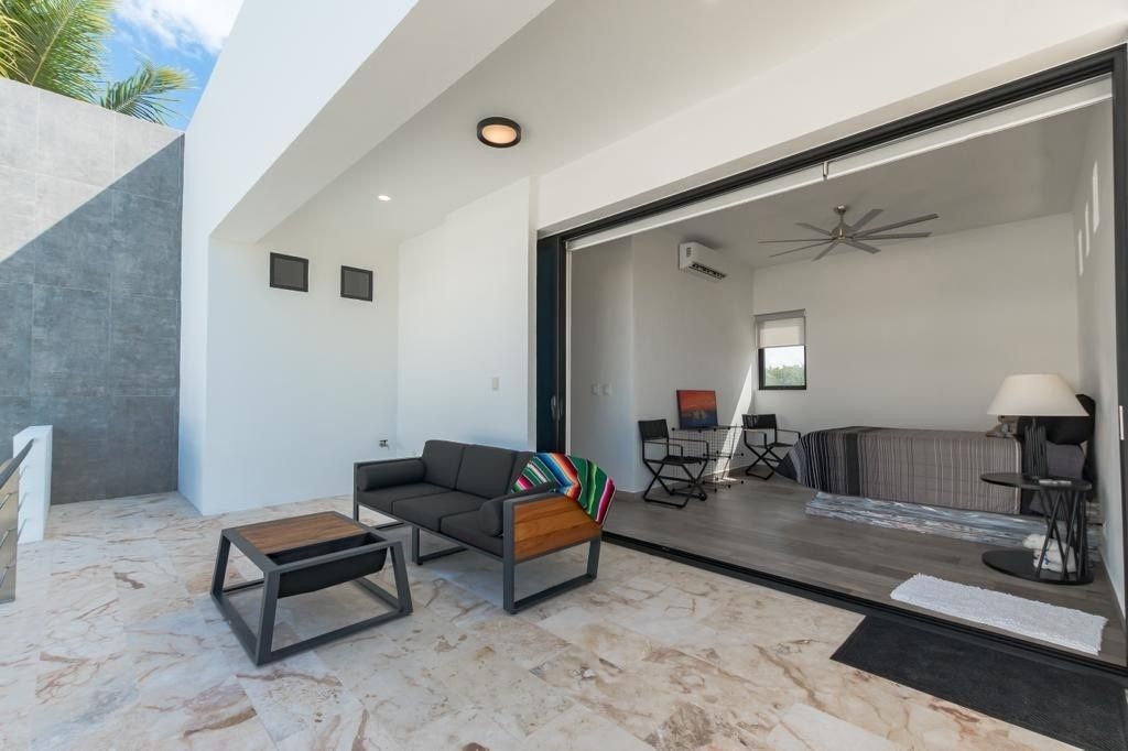 19 of 27: Terrace of the apartment, overlooking the pool