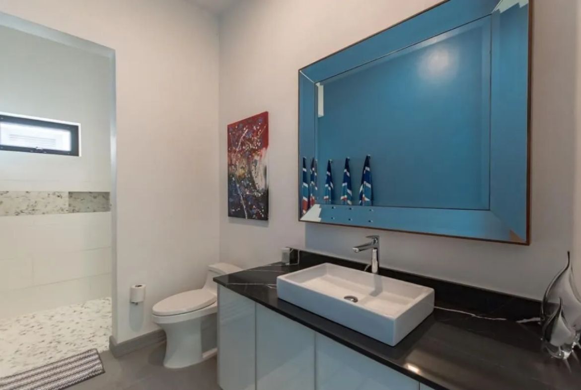 7 of 27: Bathroom of the ground floor bedroom.