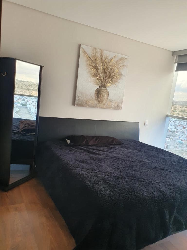 6 de 9: Recámara principal con vestidor y baño