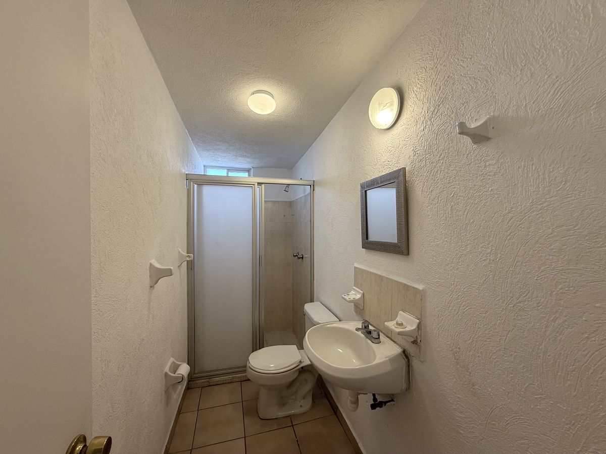 15 de 27: Baño compartido