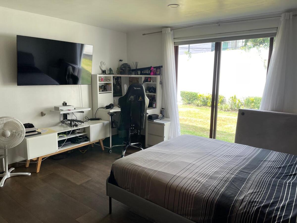 28 de 39: Cuarta recámara en PB con salida al jardín