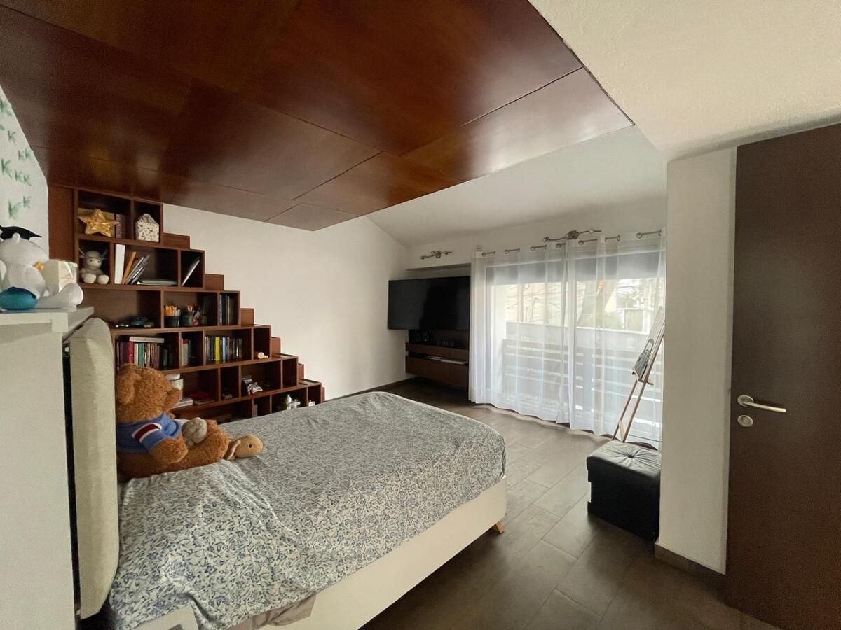 20 de 39: Recámara secundaria muebles empotrados madera de Tzalám