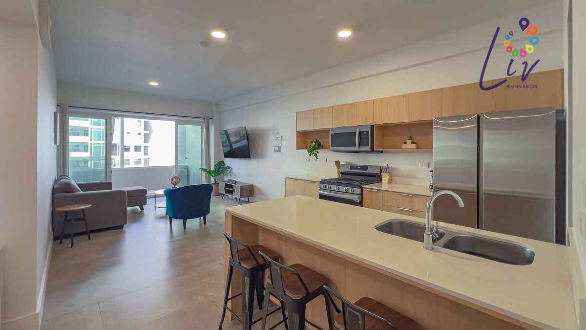 18 of 34: Condo common area - Kitchen, dining and living room