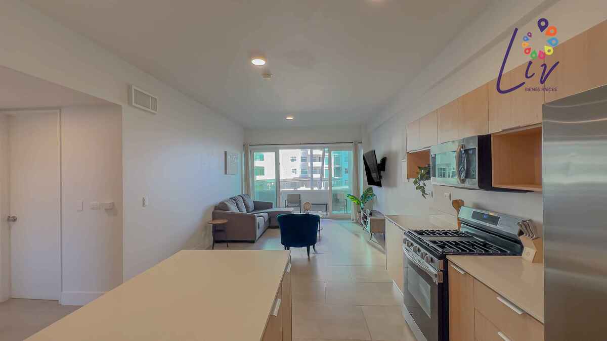 21 of 34: Condo common area - Kitchen, dining and living room