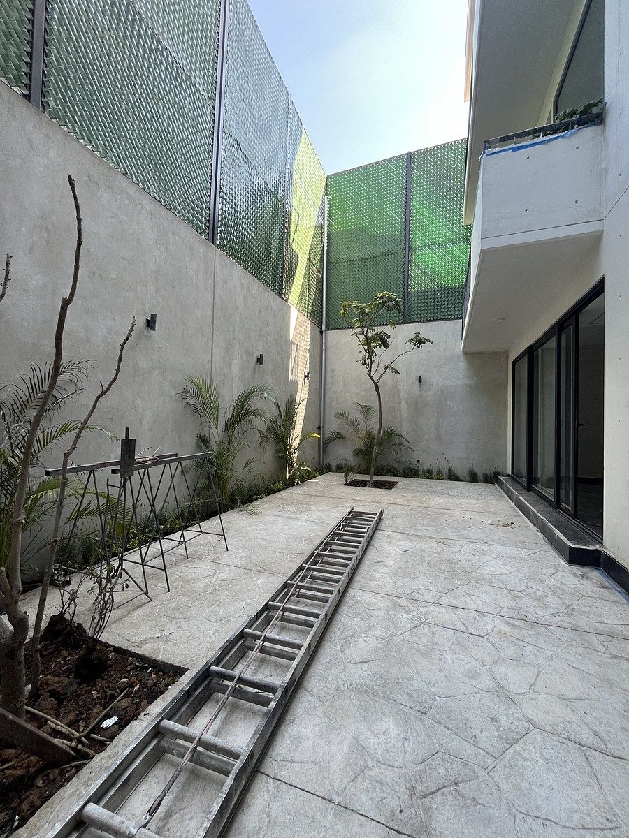 18 de 18: Patio común