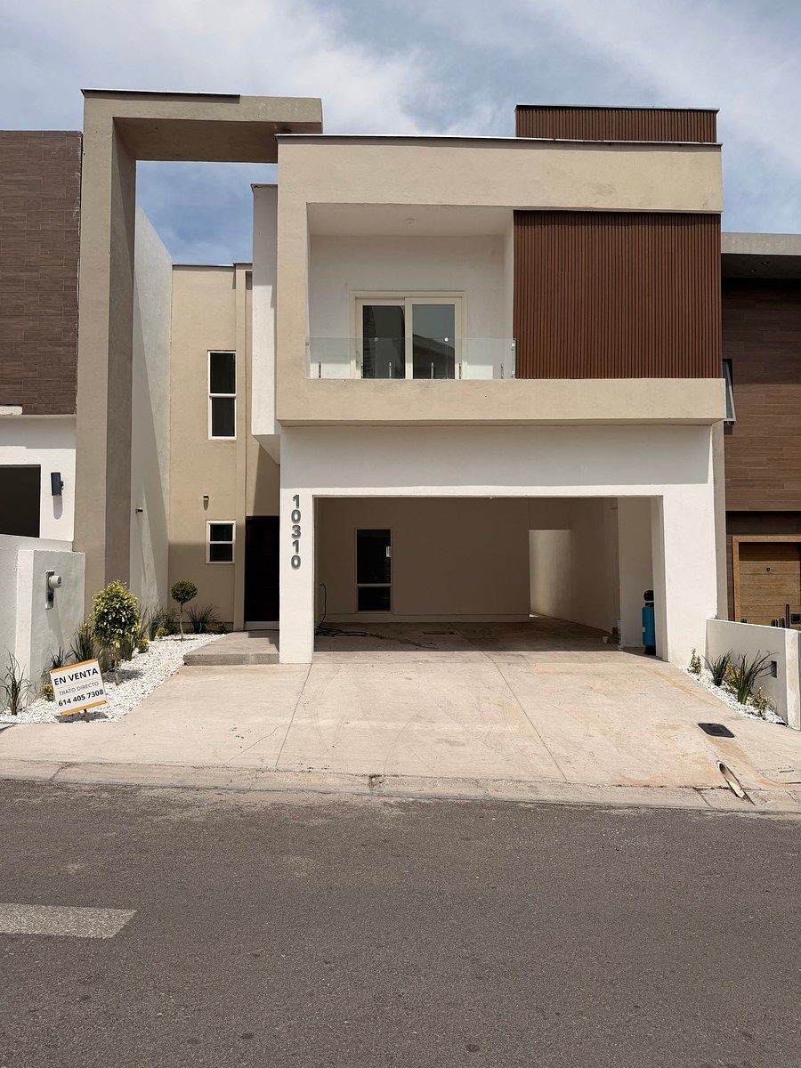 CASA EN VENTA FRENTE A PARQUE CON ESTUDIO/OFICINA, foto 1 de 14