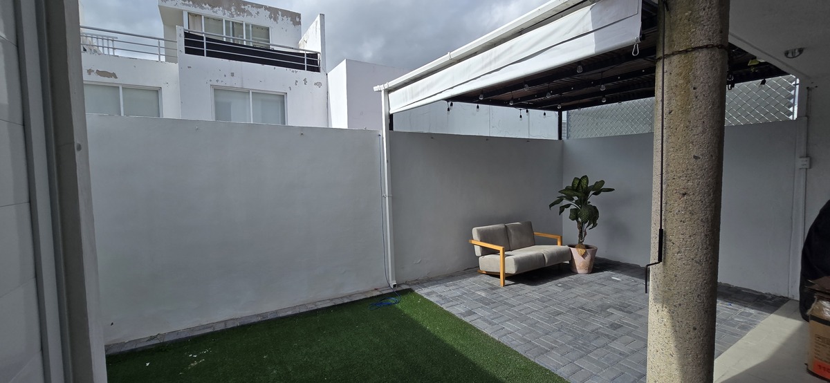 3 de 20: Patio trasero con pergola