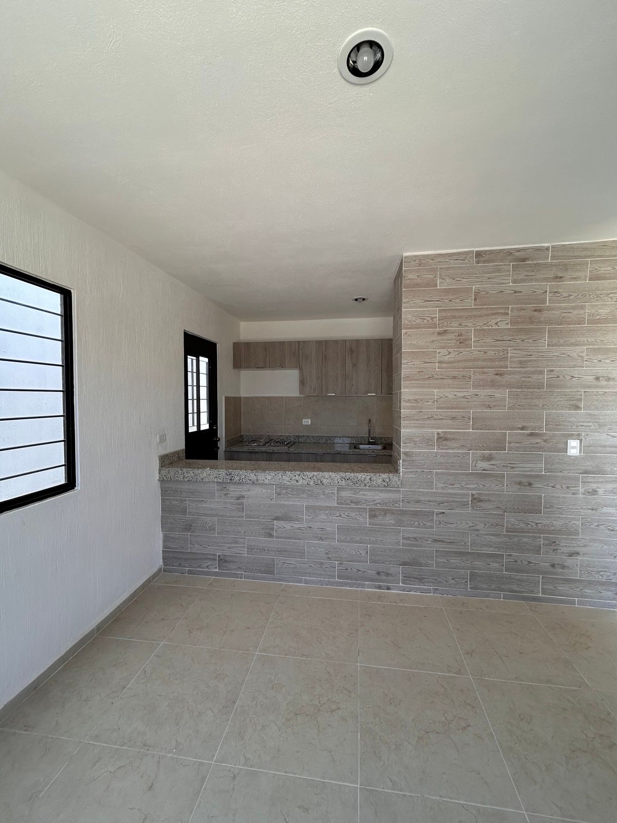 1 de 14: Incluye barra desayunadora