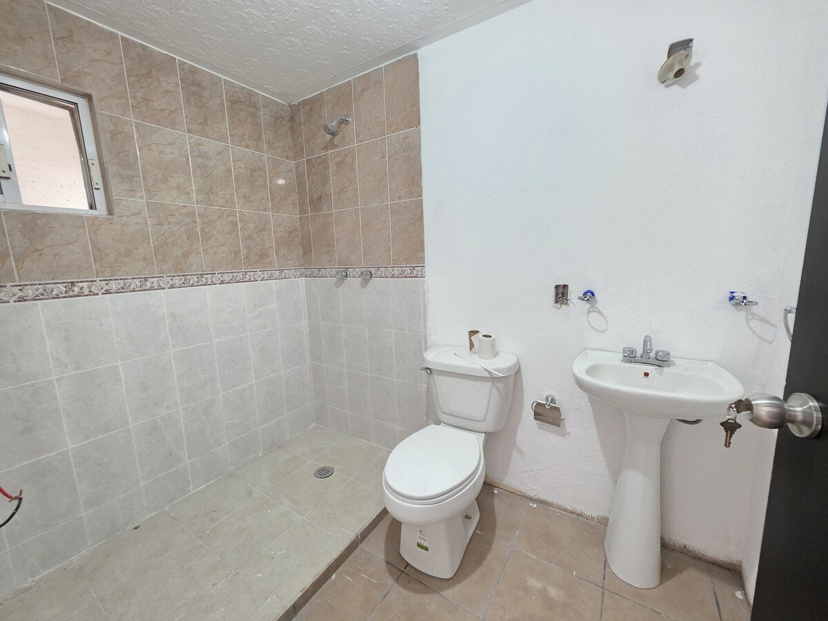 18 de 19: Baño a compartir